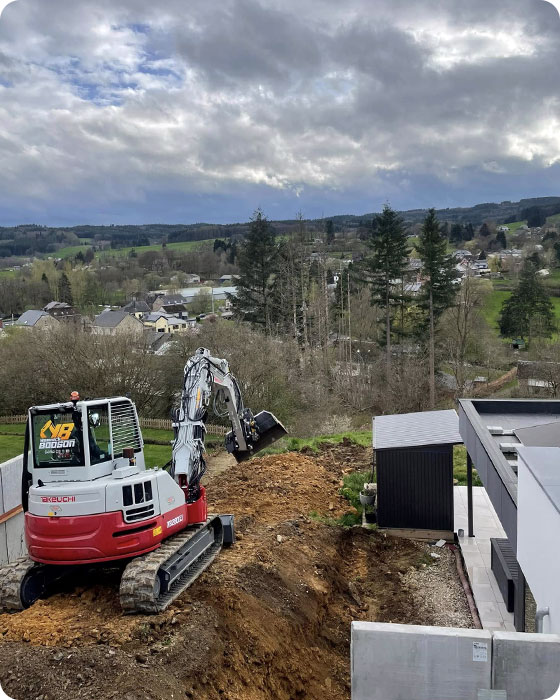 terrassement d'un jardin en pente dans la région de Vielsalm