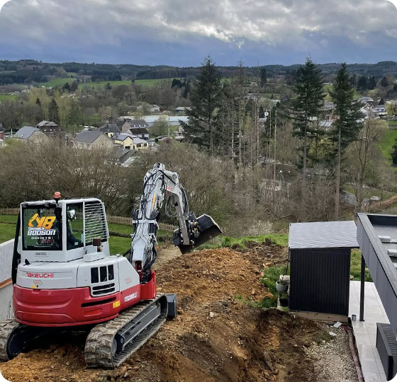terrassement d'un jardin en pente dans la région de Vielsalm