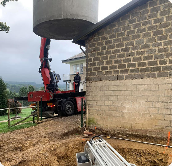 pose d'une citerne à eau de 15000 litres